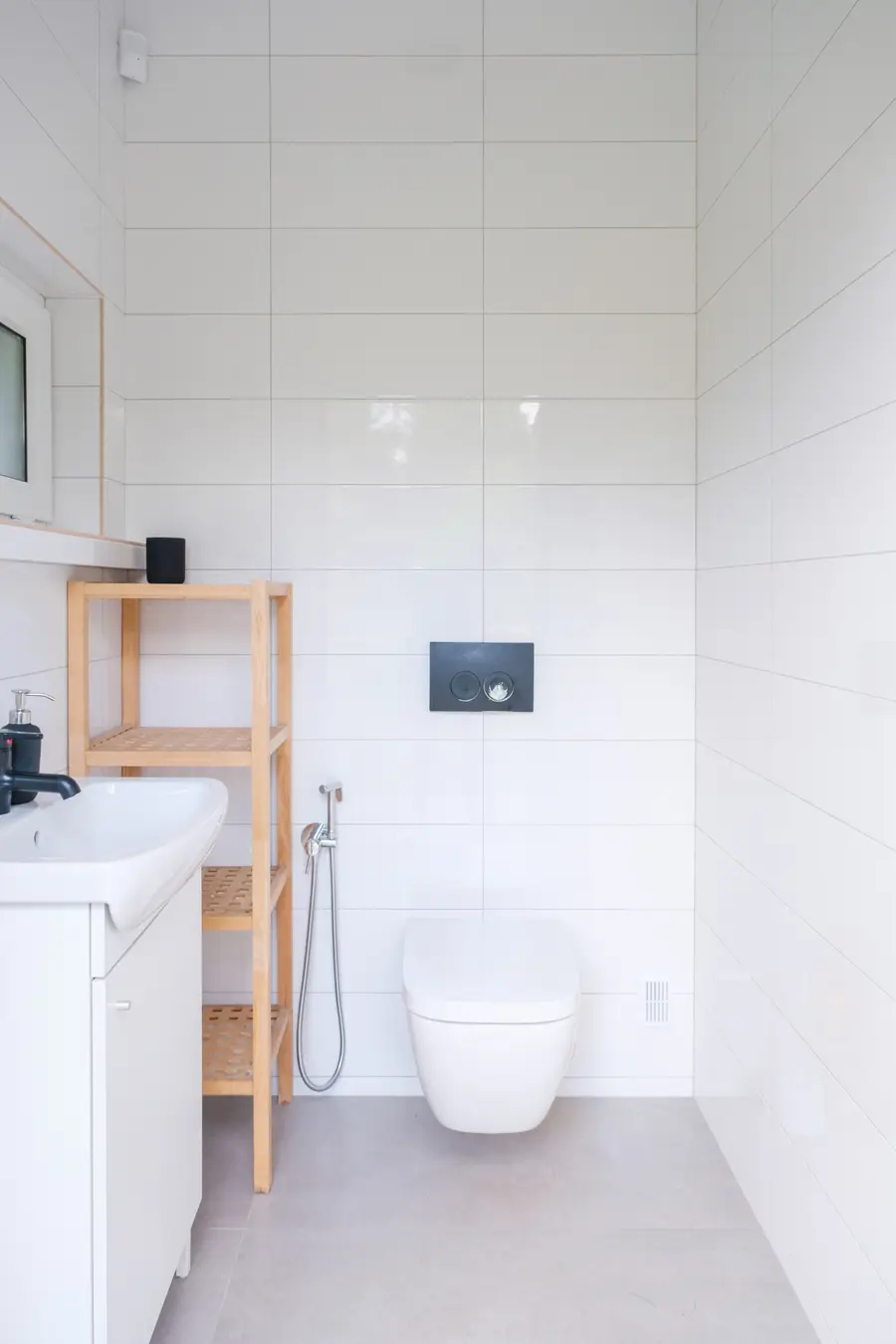 One of the two bathrooms reached from outside